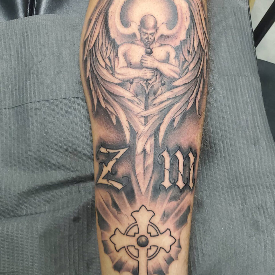 Angel Cross Tattoo Source @obscuretattoostudio via Instagram