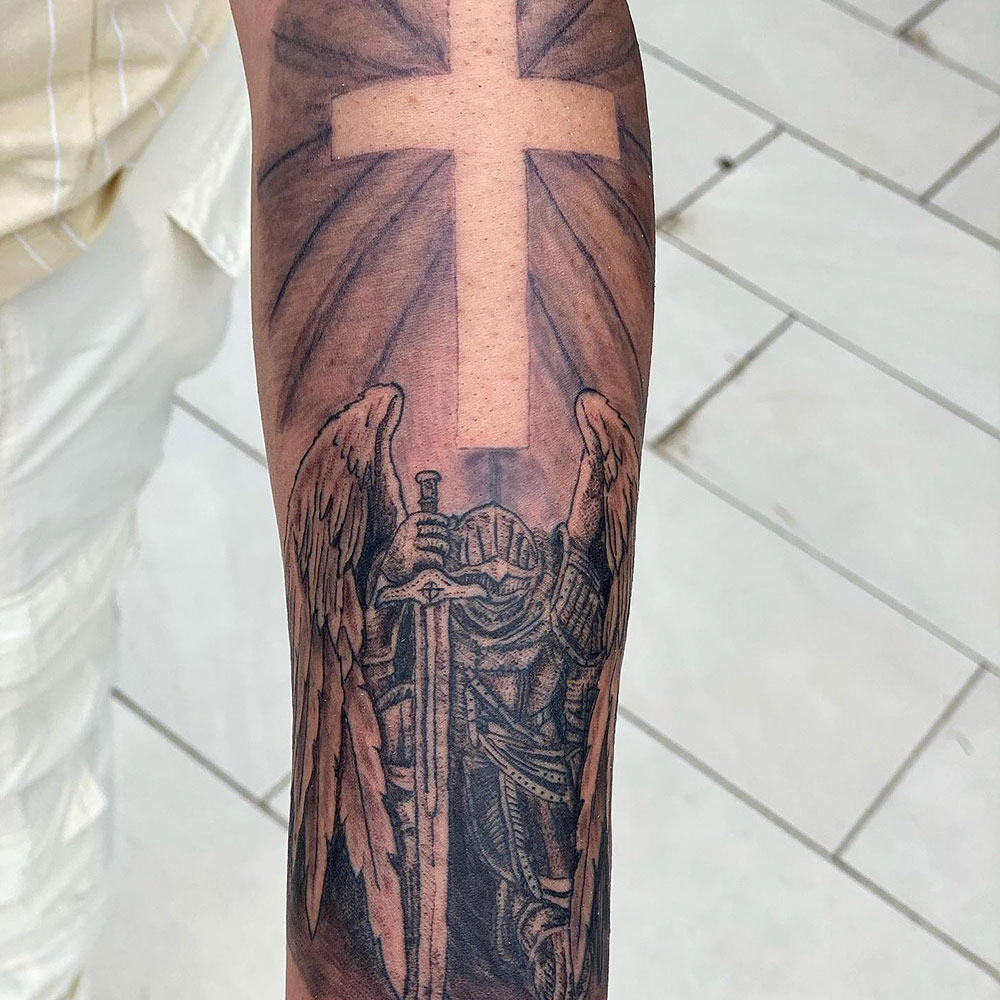 Angel Cross Tattoo Source @redeemingtattoos via Instagram