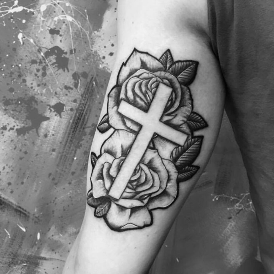 Arm Cross Tattoo Source @haze_tattoos via Instagram