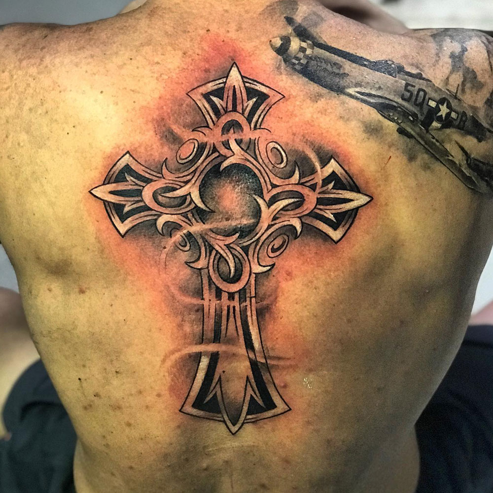Back Cross Tattoo Source @emersonferreiraatattoo via Instagram