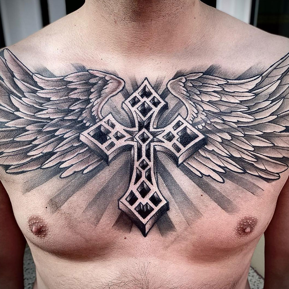 Chest Cross Tattoo Source @cassytattoo via Instagram