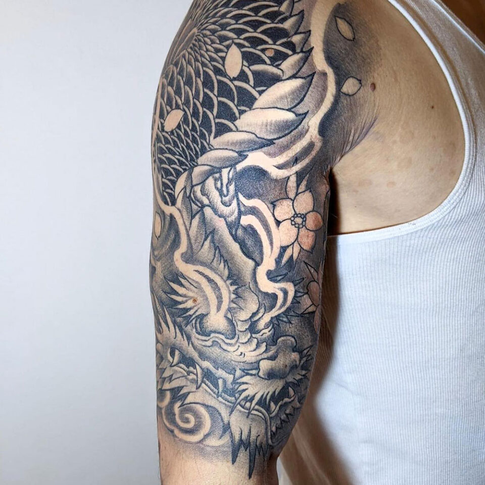 Half-Sleeve Meaningful Tattoo