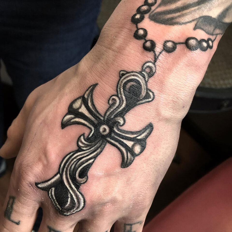Hand Cross Tattoo Source @anthonygtattoos via Instagram