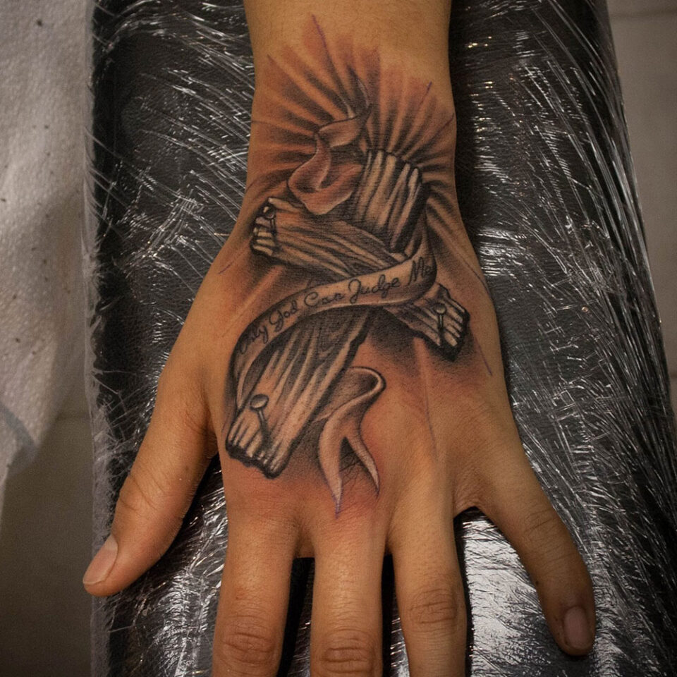Hand Cross Tattoo Source @hontattoostudio via Instagram