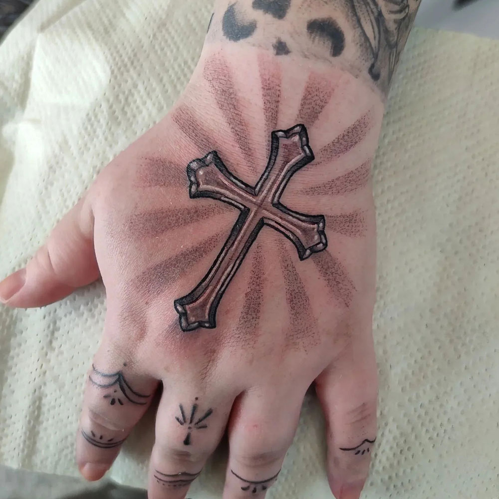Hand Cross Tattoo Source @joanna.flink via Instagram