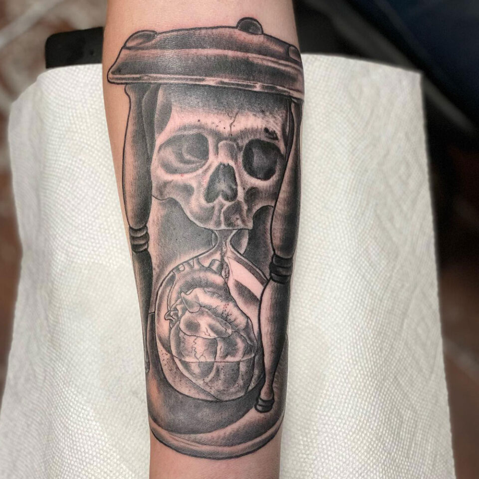 Hourglass and Skull Arm Tattoo