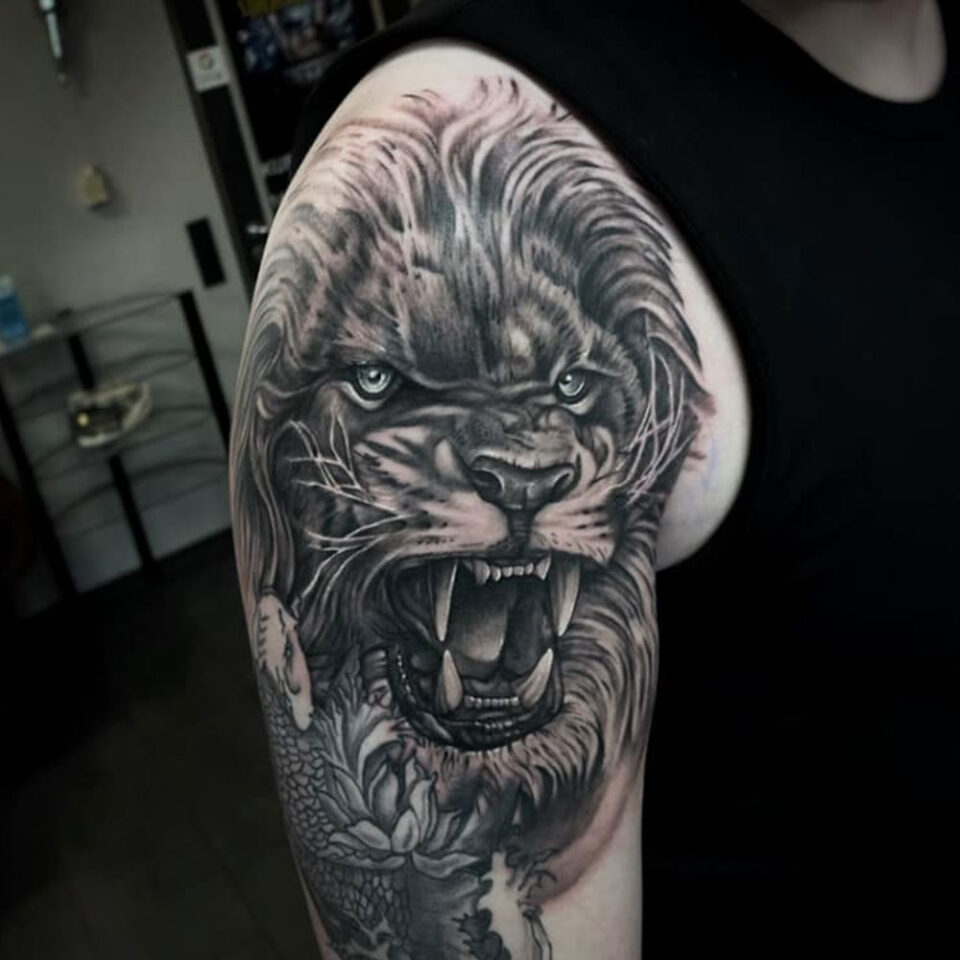 Lion Arm Tattoo