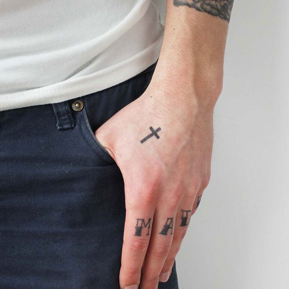 Minimalist Cross Tattoo