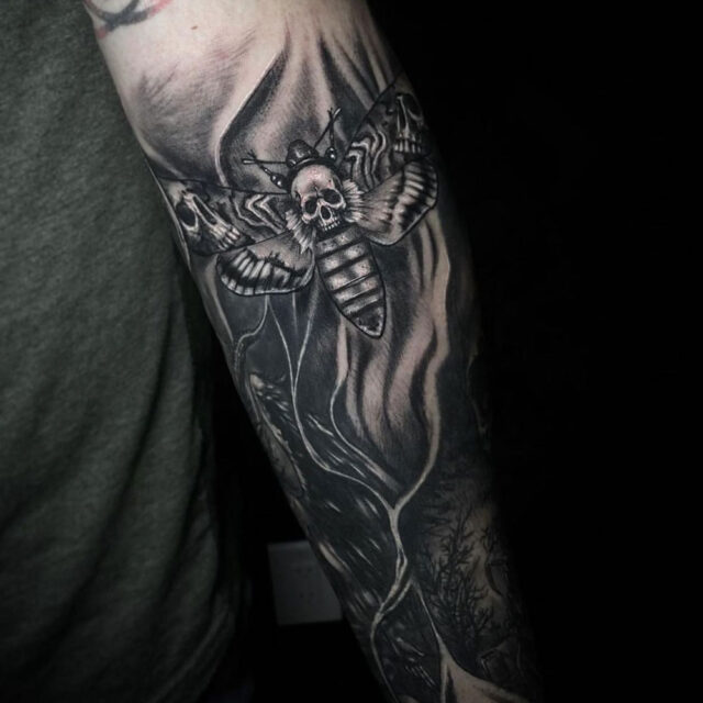Tatuagem de braço de mariposa