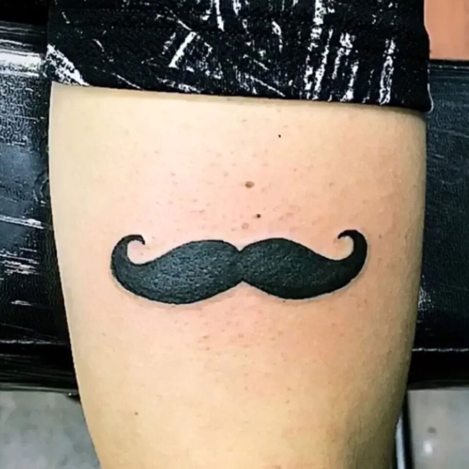 Moustache Arm Tattoo