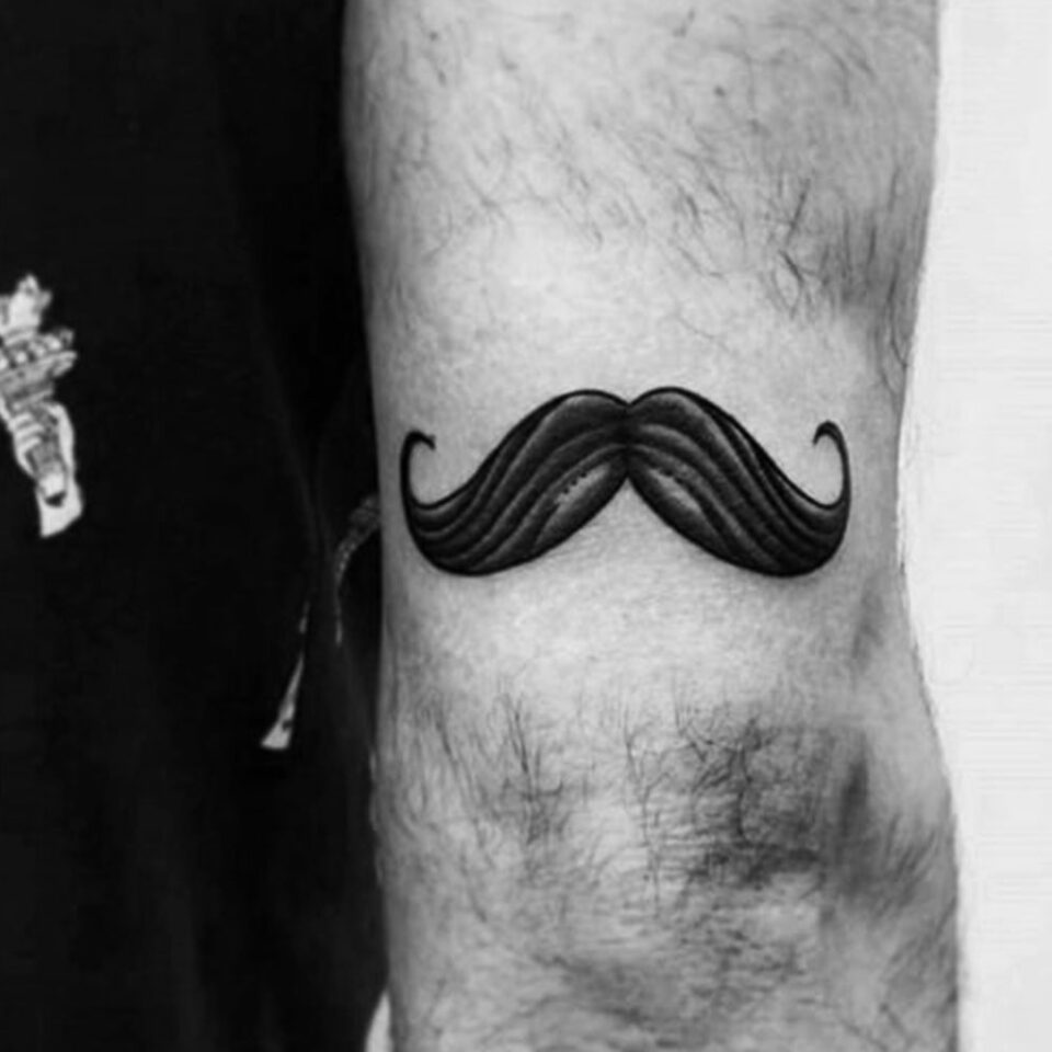 Moustache Arm Tattoo
