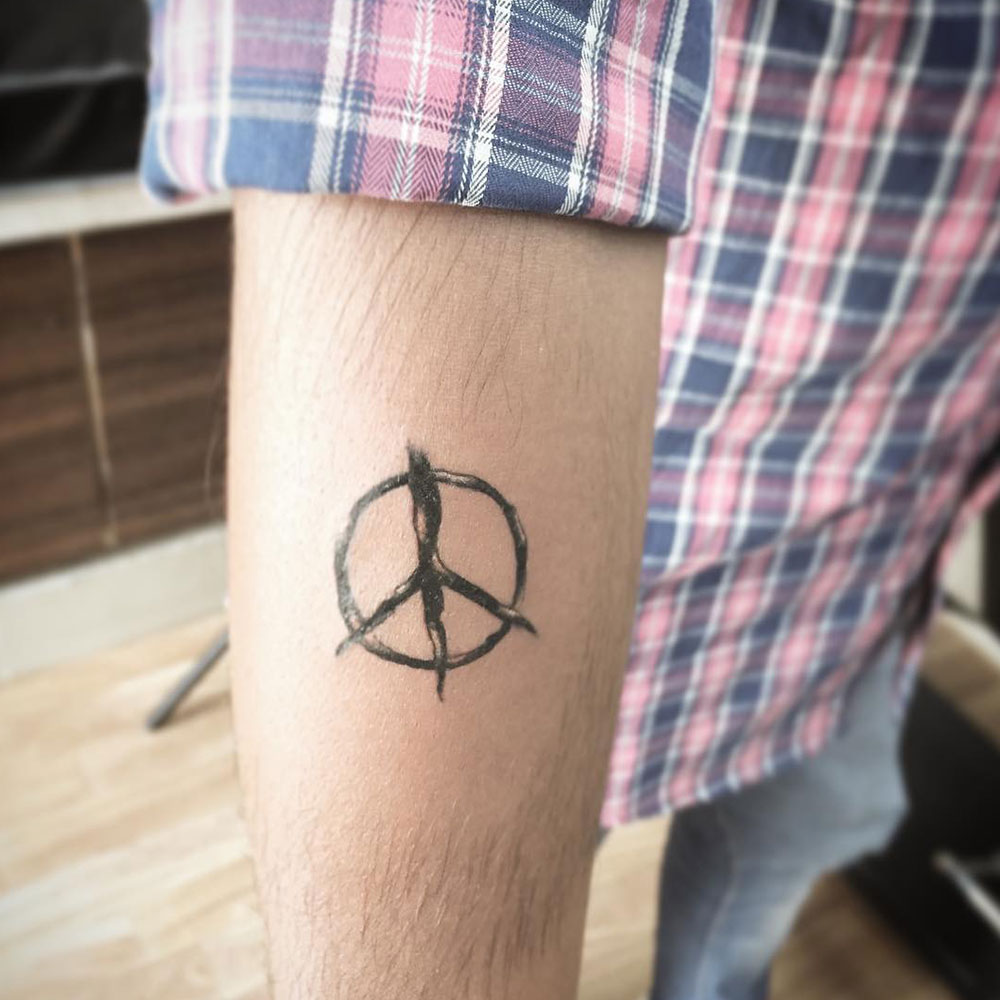 Peace Sign Tattoo And Peace Sign Tattoo Meanings-Peace Sign Tattoo Ideas  And Tattoo Pictures - HubPages