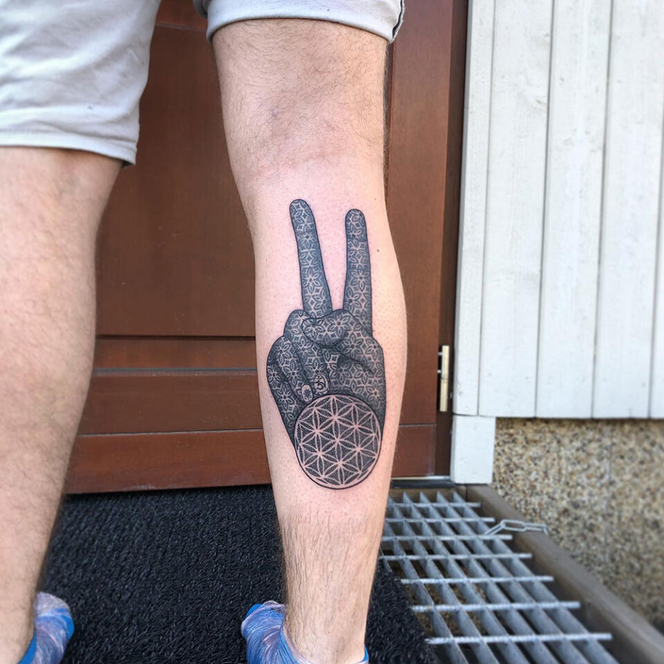 Peace Sign Meaningful Tattoo