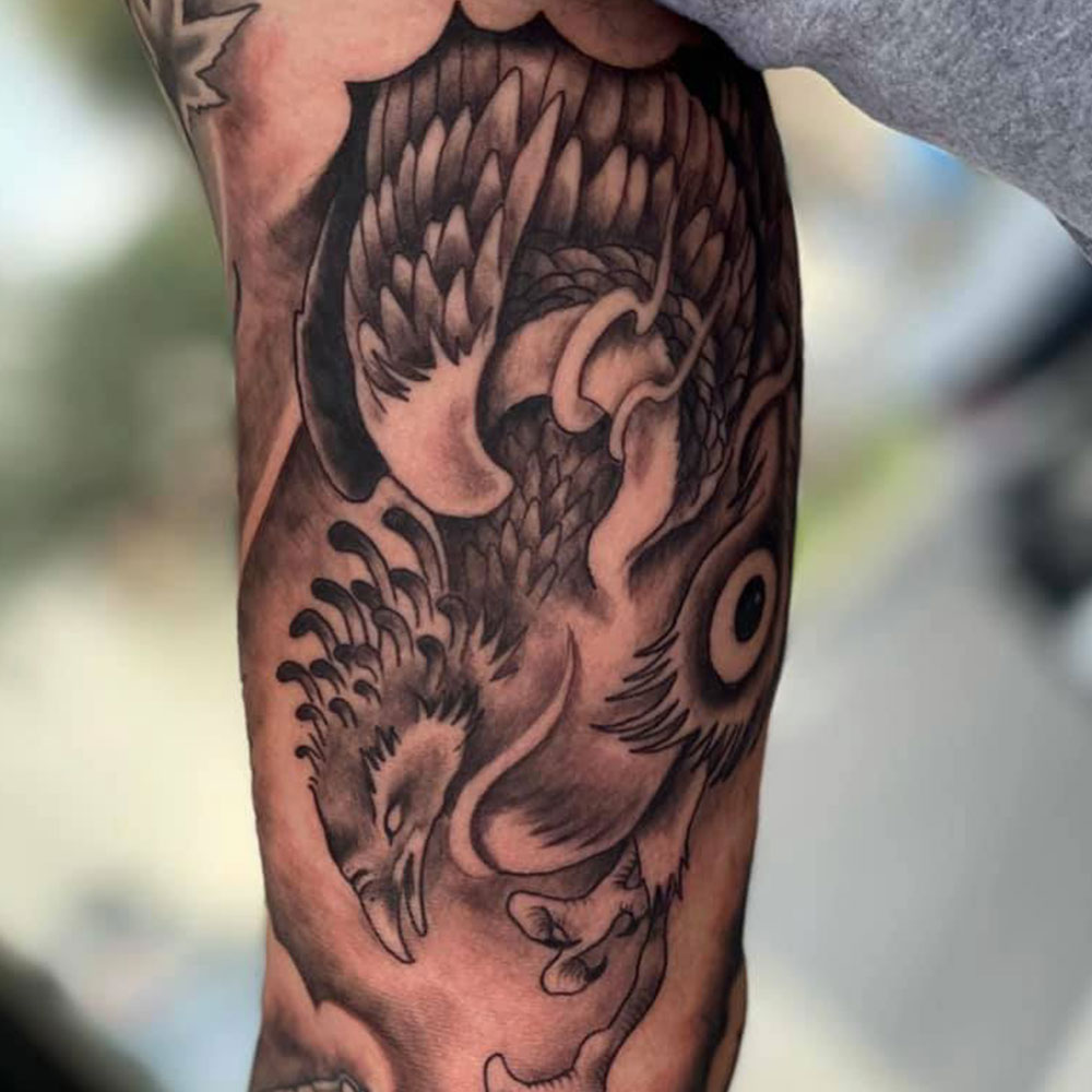 Phoenix Arm Tattoo