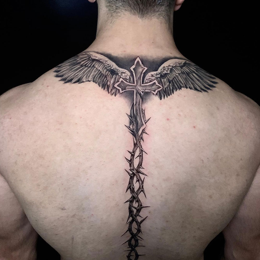 Shoulder Cross Tattoo Source @samtattoo_art via Instagram