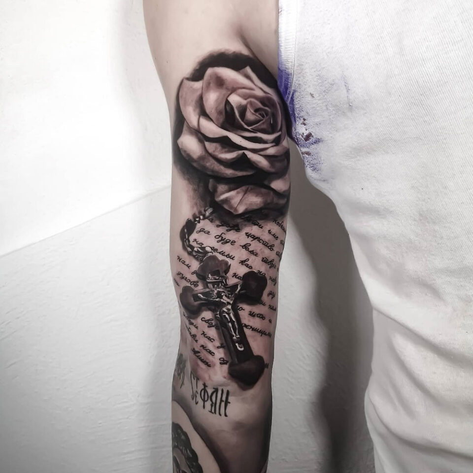 Sleeve Cross Tattoo Source @peki_tattoo via Instagram