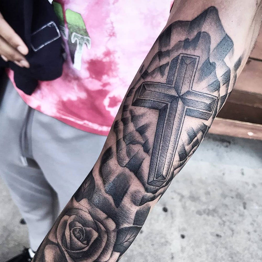 Sleeve Cross Tattoo Source @puro_vato_loco via Instagram
