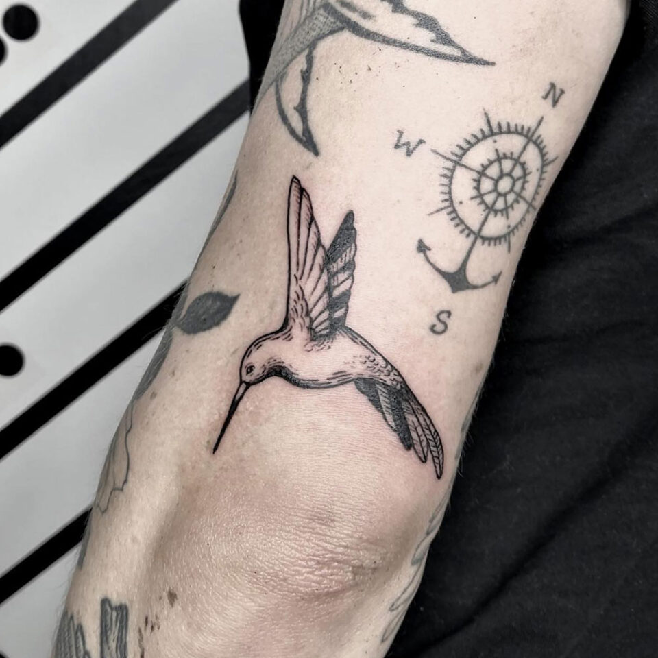 Small Sparrow Arm Tattoo