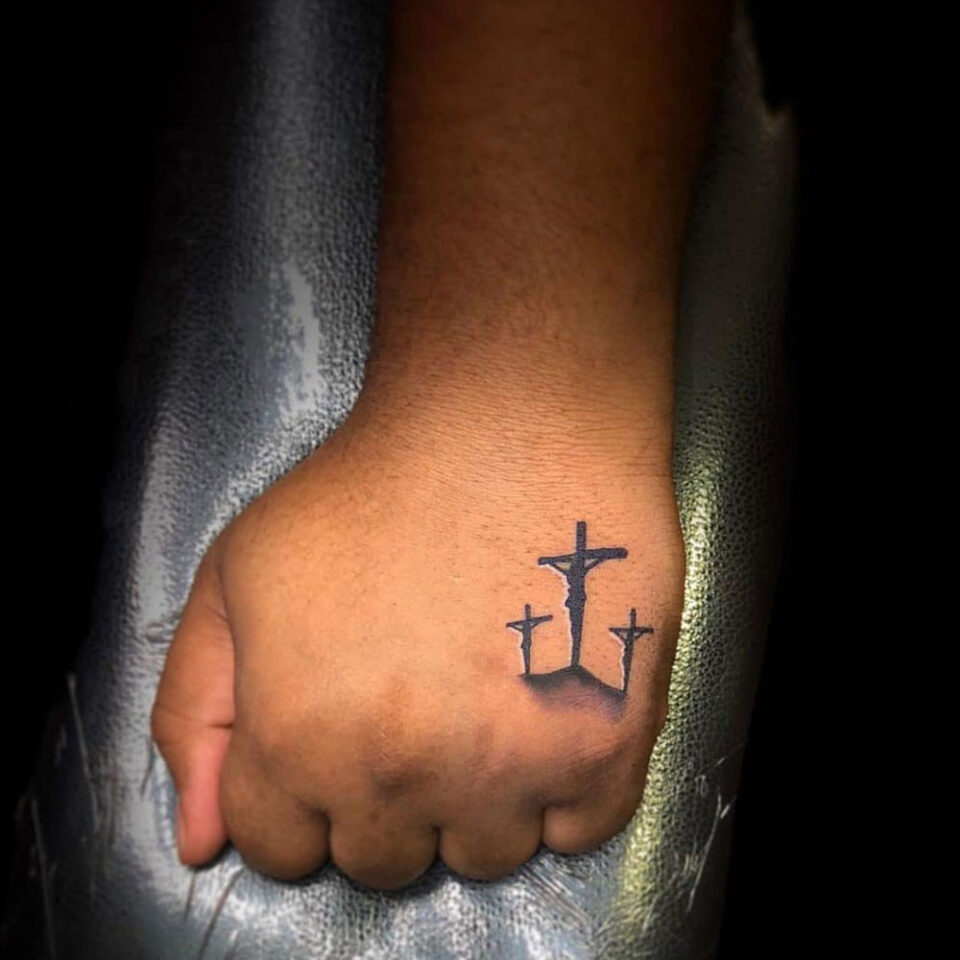 Three Cross Tattoo Source @inkedbyaj via Instagram