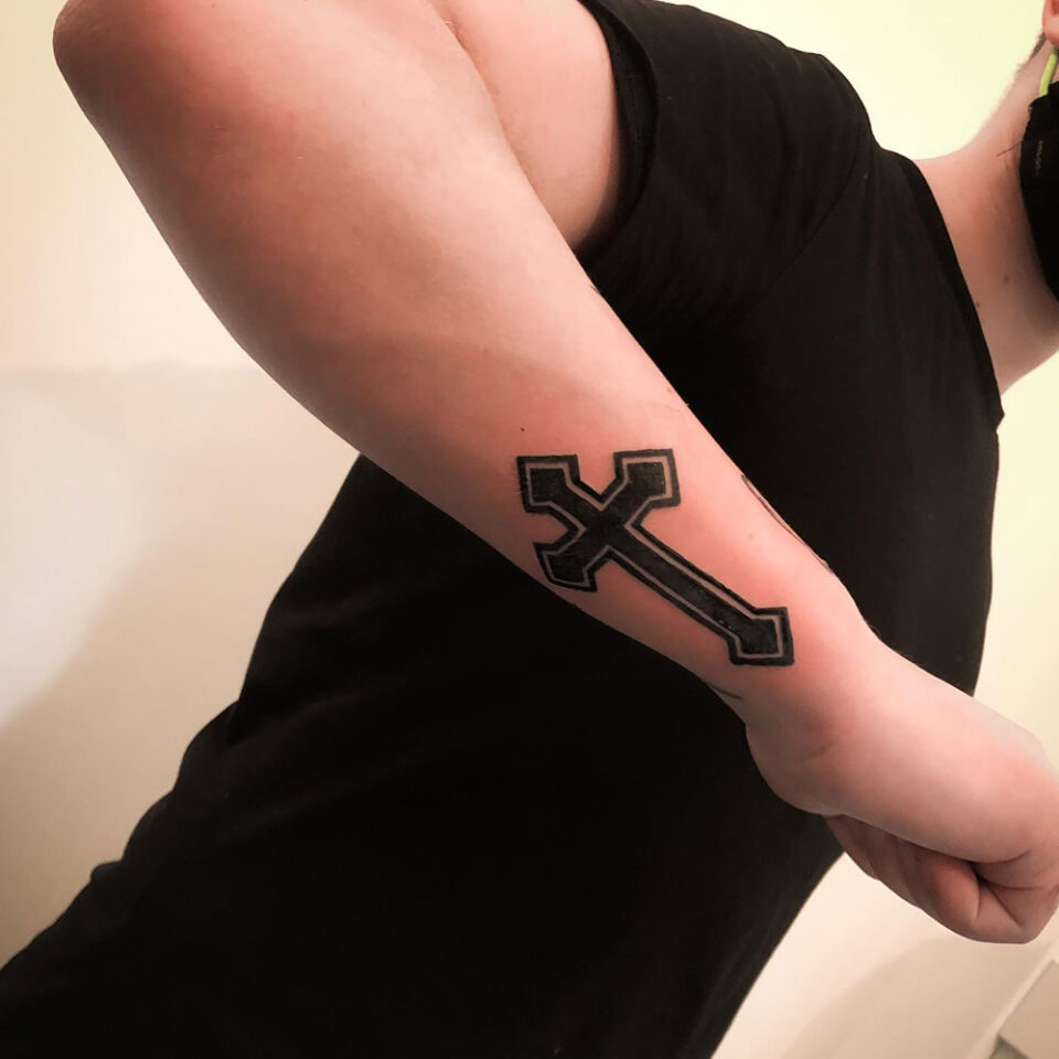 Wrist Cross Tattoo Source @artdeertattoo via Instagram