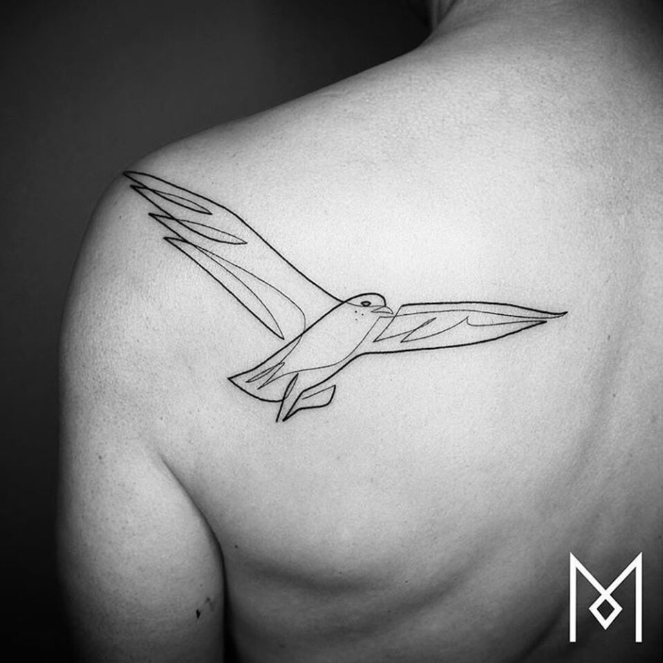 Bird in Flight Single Line Tattoo Source @moganji via Instagram