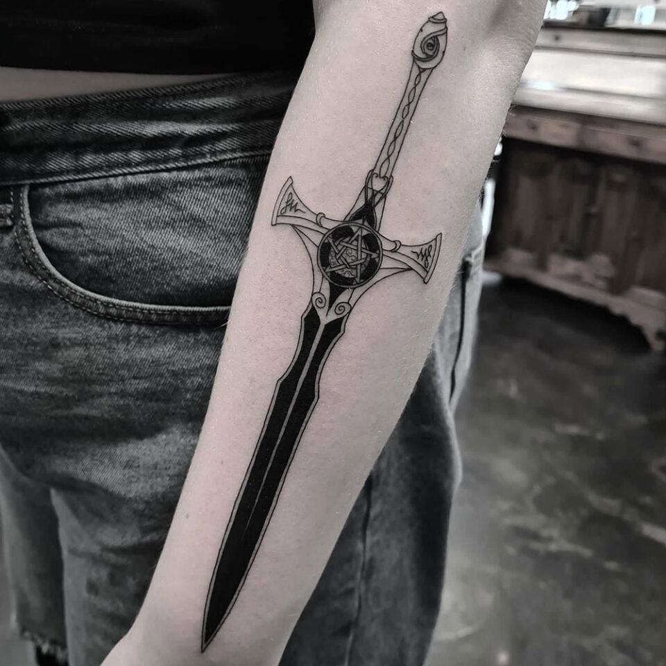 Celtic Sword tattoo Source @mikura_tattoo via Instagram