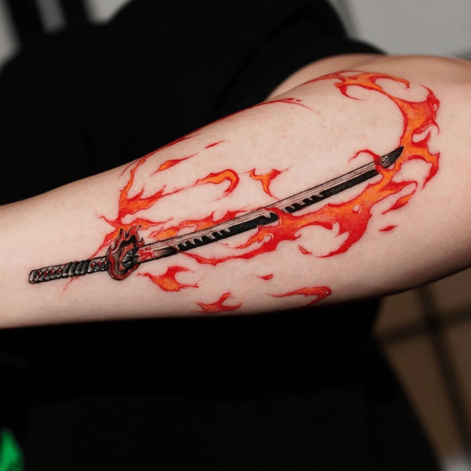 Demon Slayer Sword Tattoo Source @animemasterink via Instagram