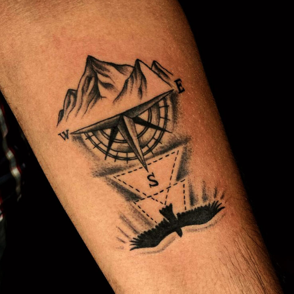 Eagle and Compass Tattoo Source The Art Ink Tattoo Studio via Facebook