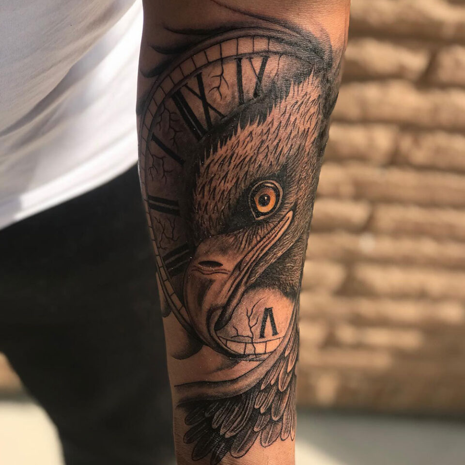 Eagle tattoo with a Clock Source Pleasure With Poke via Instagram