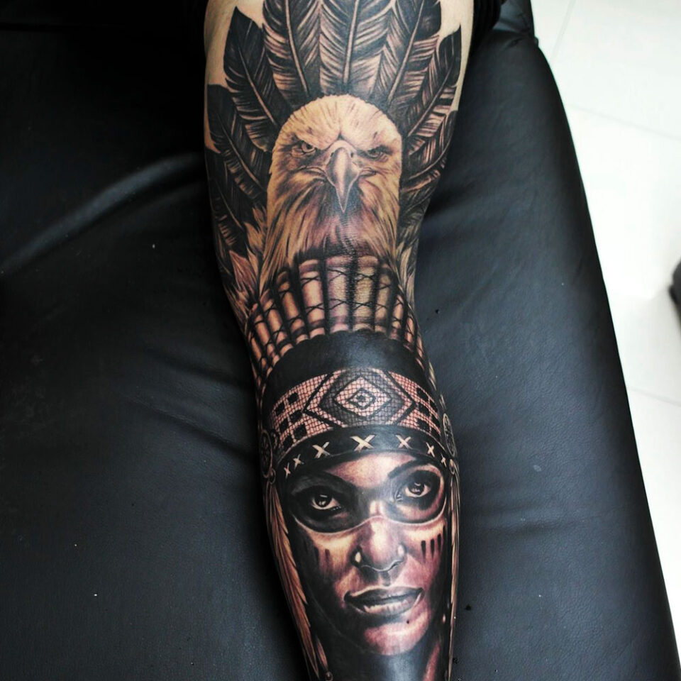 Eagle tattoo with a Mask Source @aussinetattoophuket via Instagram