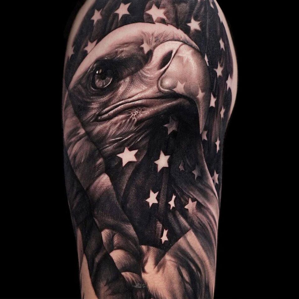 Eagle tattoo with a Patriotic flag Source Body Cult Tattoo Supplies via Facebook