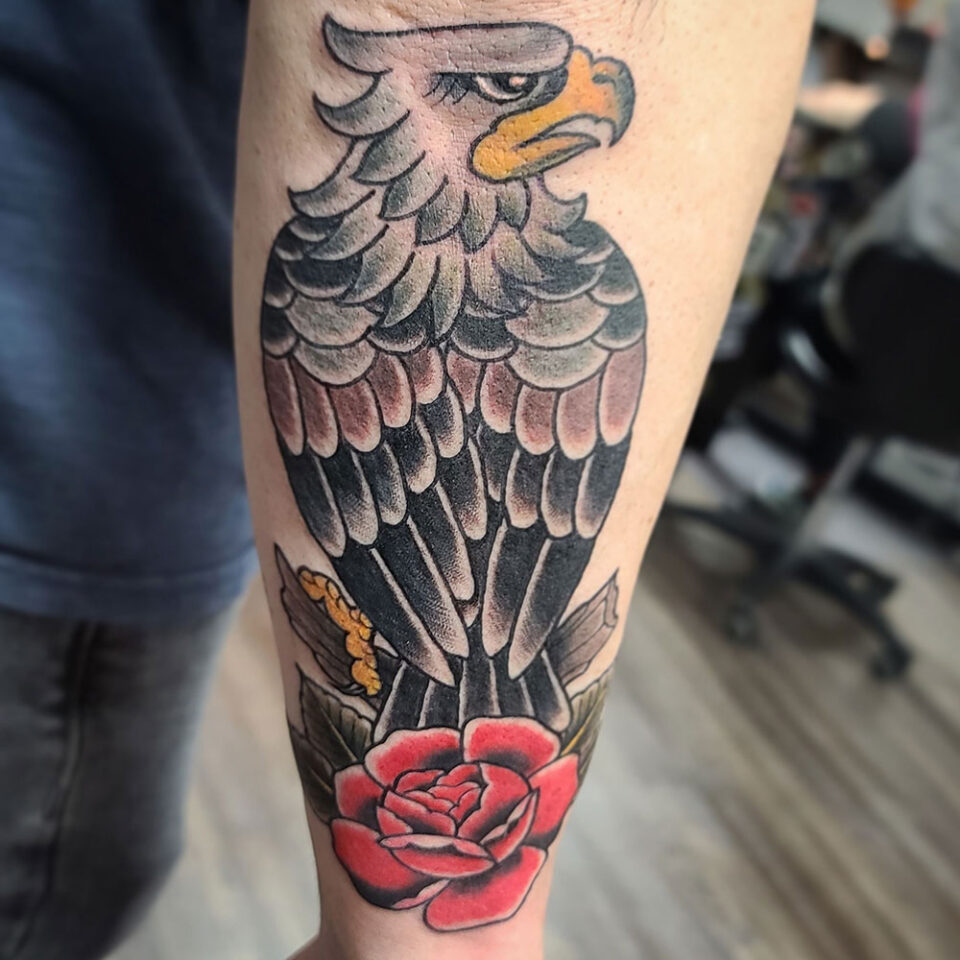 Eagle with Rose Tattoo Source @vintagerosetattoo via Instagram