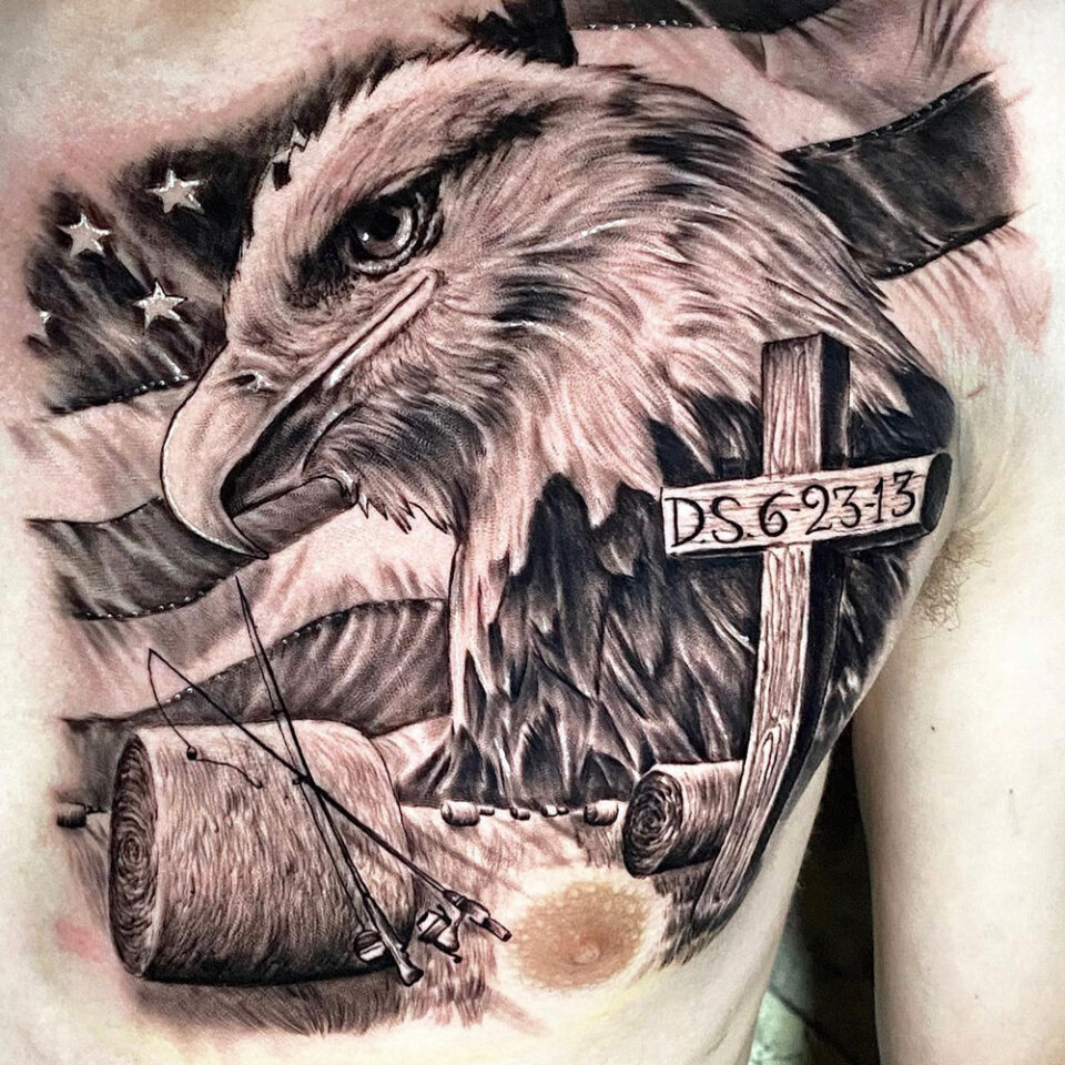Eagle with a Cross Tattoo Source Alan barbosa tattoos via Facebook
