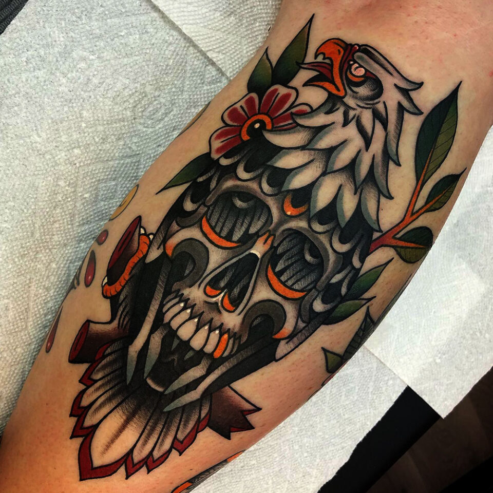 Eagle with its talons around a skull Source @sostattoos via Instagram