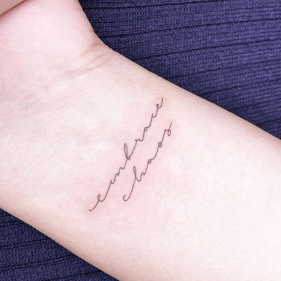 Embrace the Chaos Single Line Tattoo Source @sop_tattoo via Instagram
