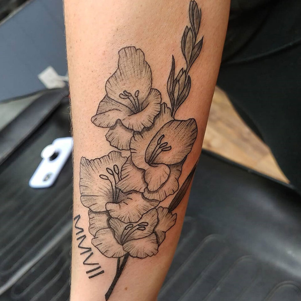 Gladiolus floral tattoo sourced via IG @ace4627