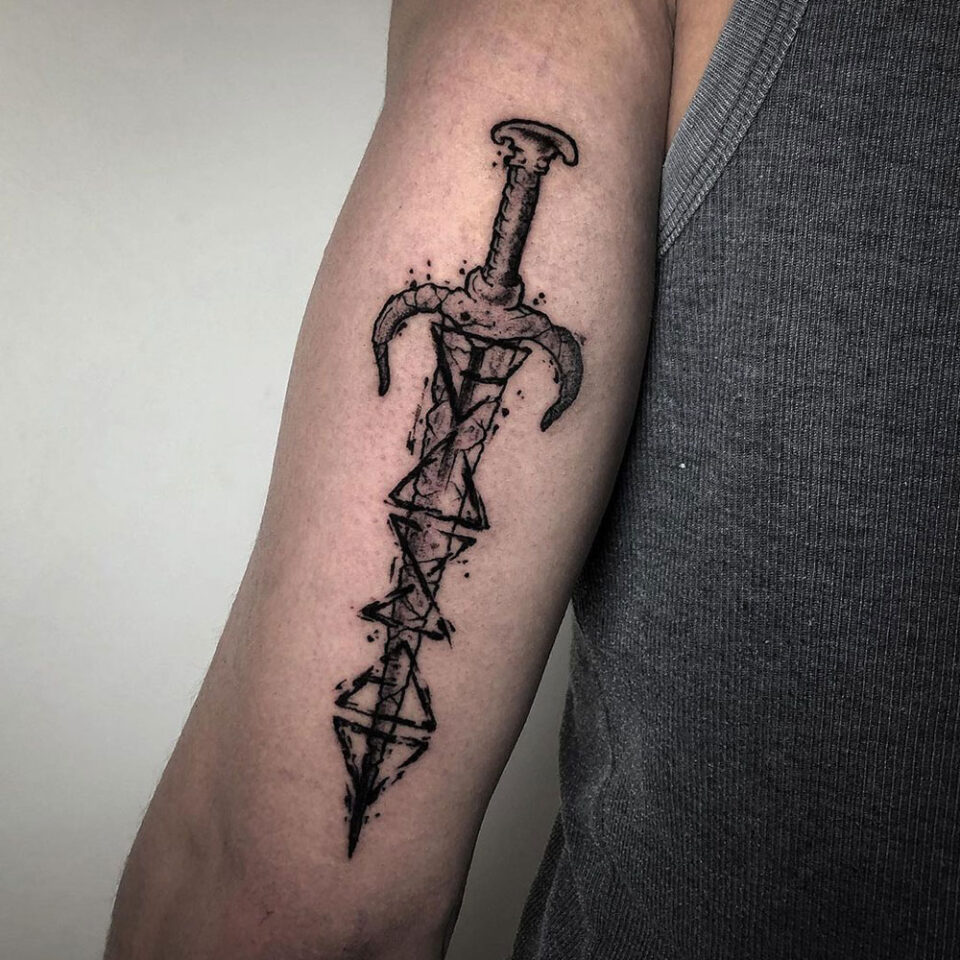 Gothic sword tattoo Source @tourcoingink via Instagram