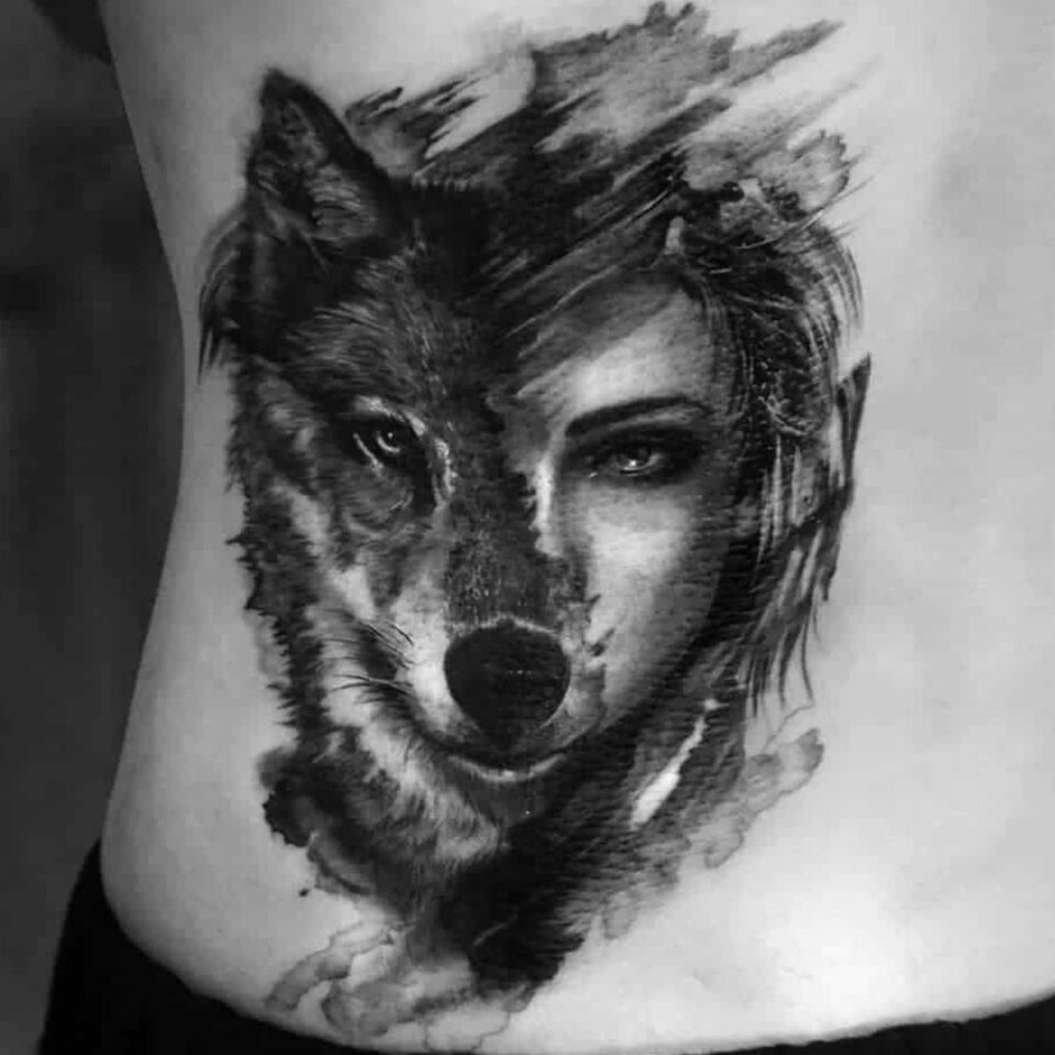 halfwolf halfhuman face tattoo Source @tattooist_hell via Instagram
