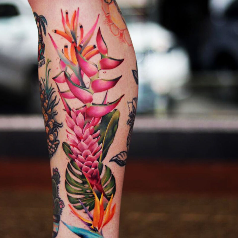 Heliconia floral tattoo sourced via IG @v_lunatatto