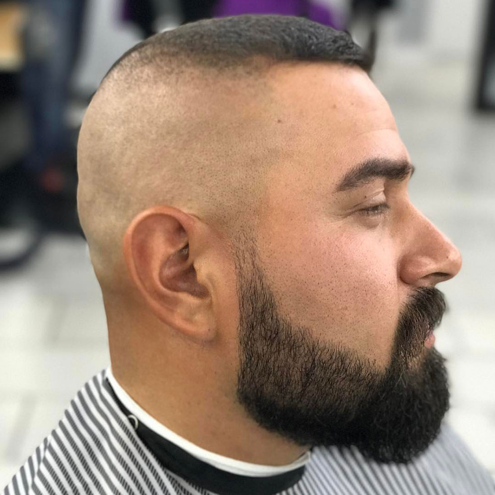High and Tight Bald Fade Military Haircut Source @fadeaholix via Instagram