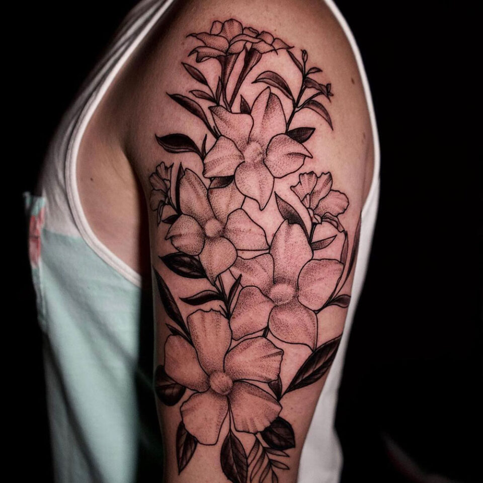 Jasmine floral tattoo sourced via IG @mikelopeztattoo