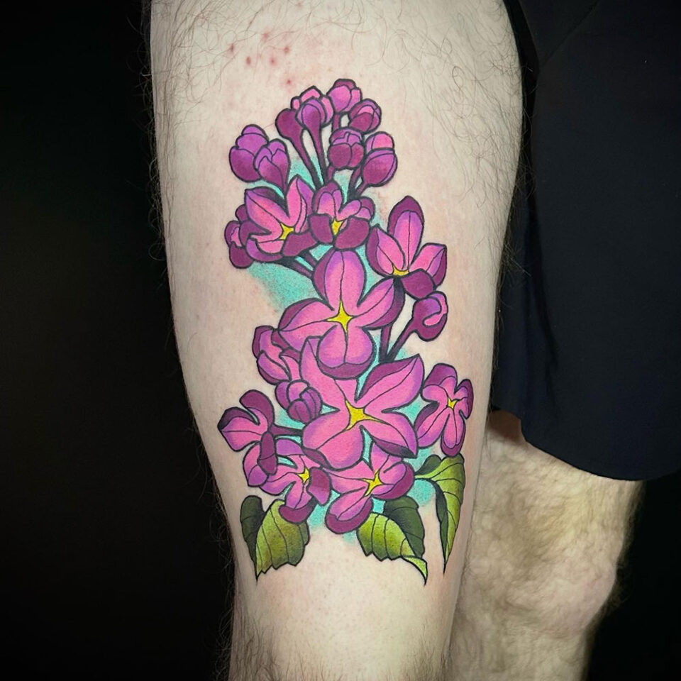 Lilac floral tattoo sourced via IG @visionstattoogallery