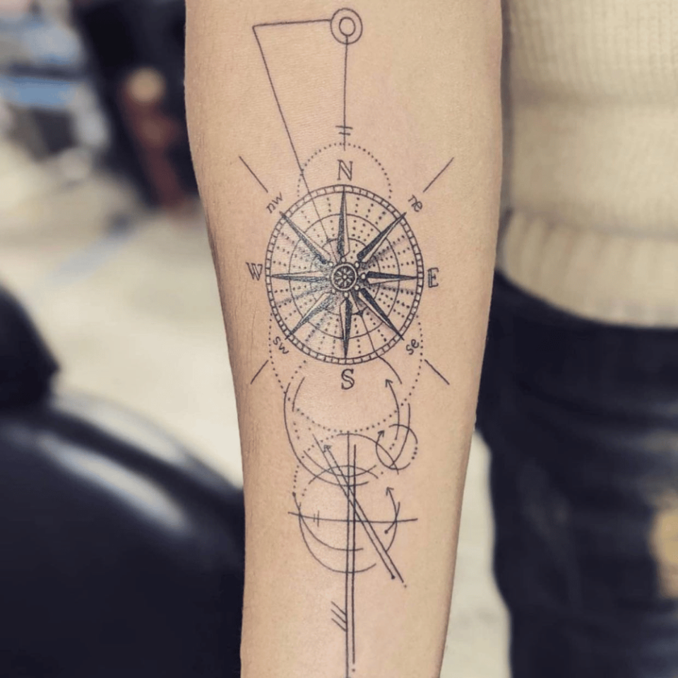Linework Compass Tattoo Source @village_tattoo_nyc via Instagram