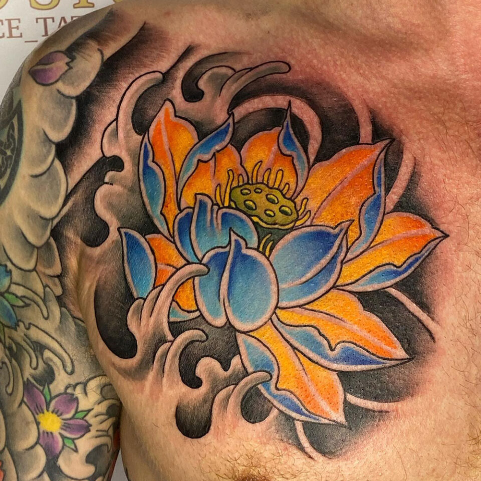 Lotus floral tattoo sourced via IG @ryanfuttart