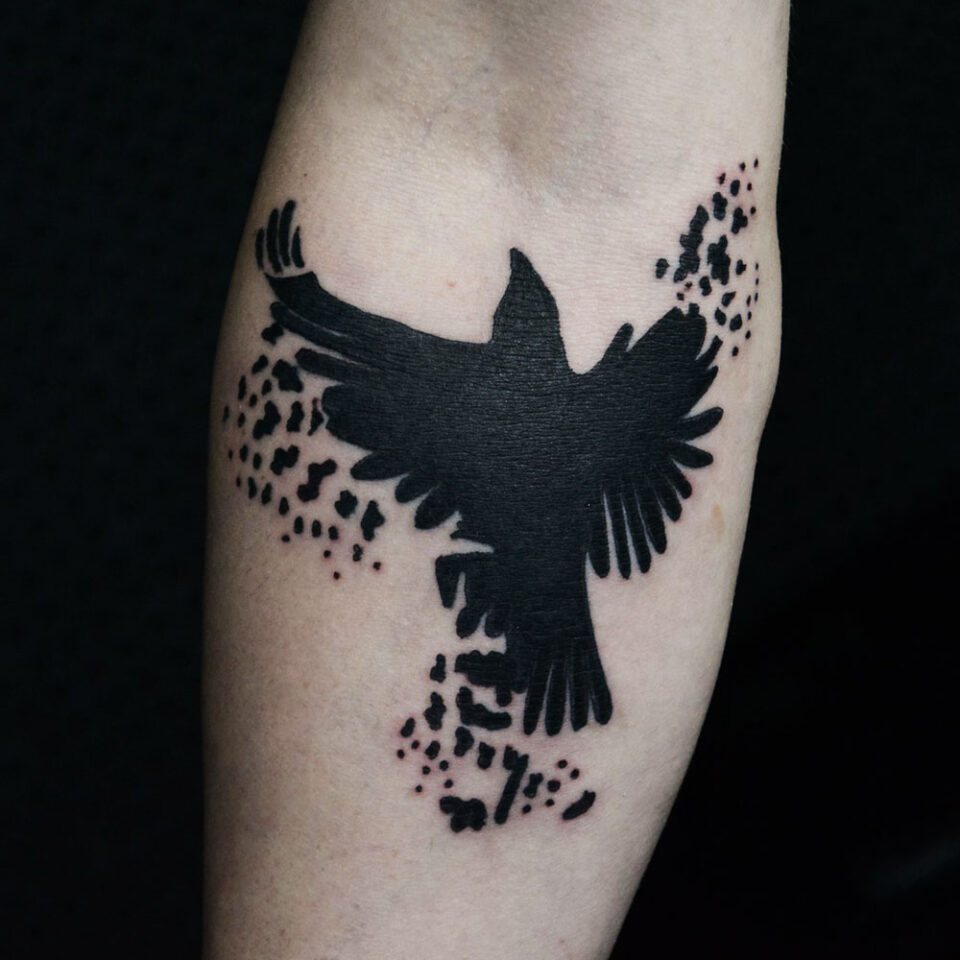 Minimalist Eagle silhouette tattoo Source Tattoo Hazma via Facebook
