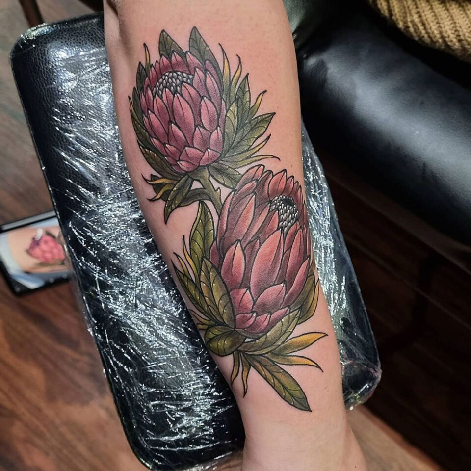 Protea floral tattoo sourced via IG @the_tattoo_society
