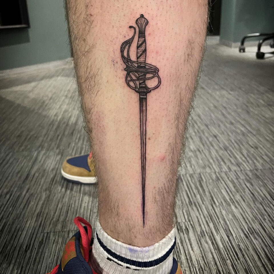 Rapier sword tattoo Source @blekknroll via Instagram