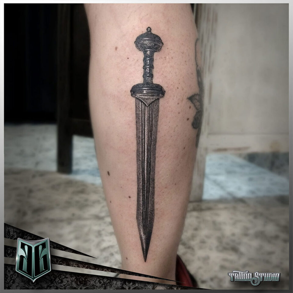 Roman sword tattoo Source @arielgoldenberg.ag via Instagram