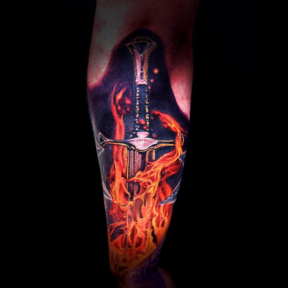 Saber sword tattoo Source @marc_robertsontattoos via Instagram