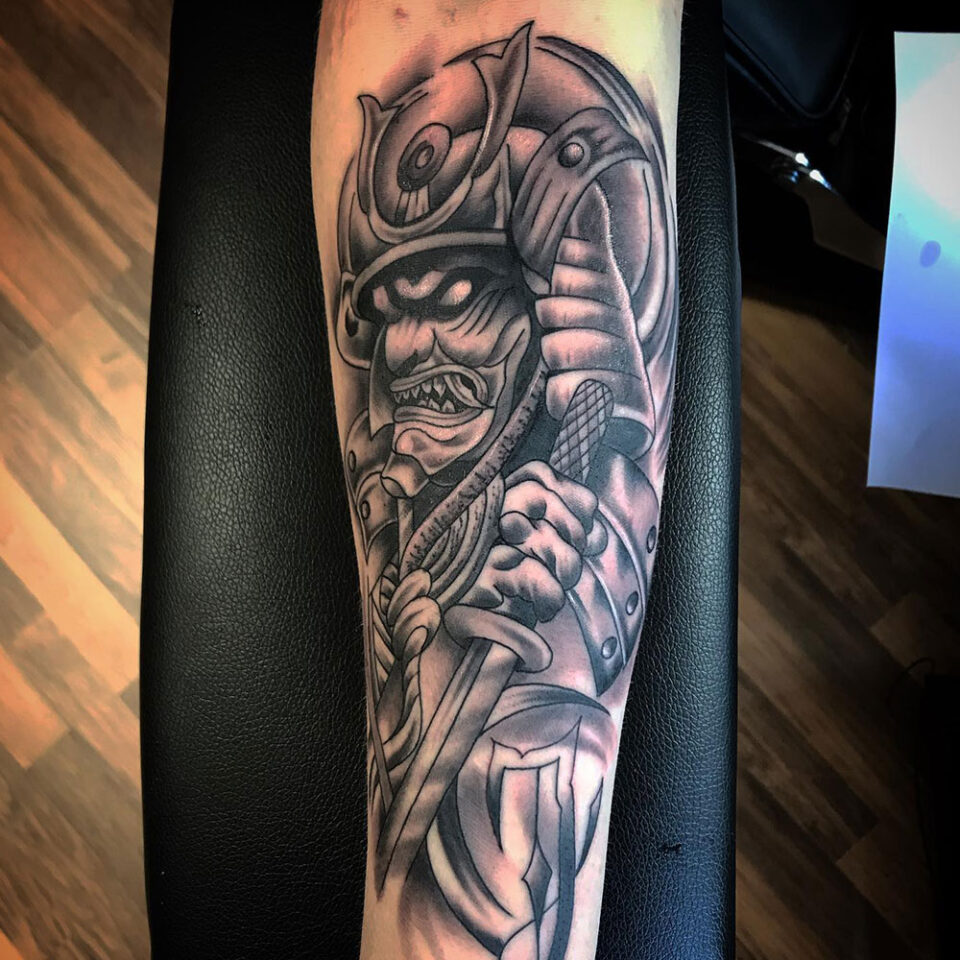 Samurai armour with sword tattoo Source @balmtattoogermany via Instagram
